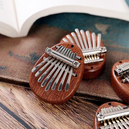 Mini Kalimba Piano 8 Keys + Free Music Book